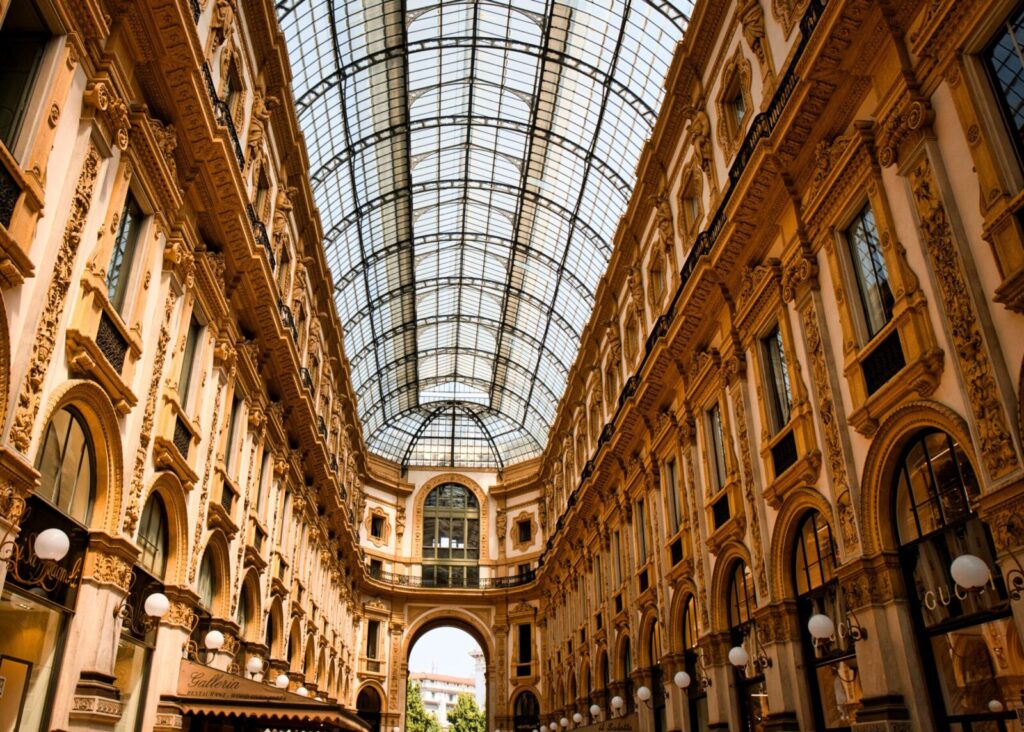 Explore the stunning architecture of the Galleria Vittorio Emanuele II, Milan's iconic shopping arcade.